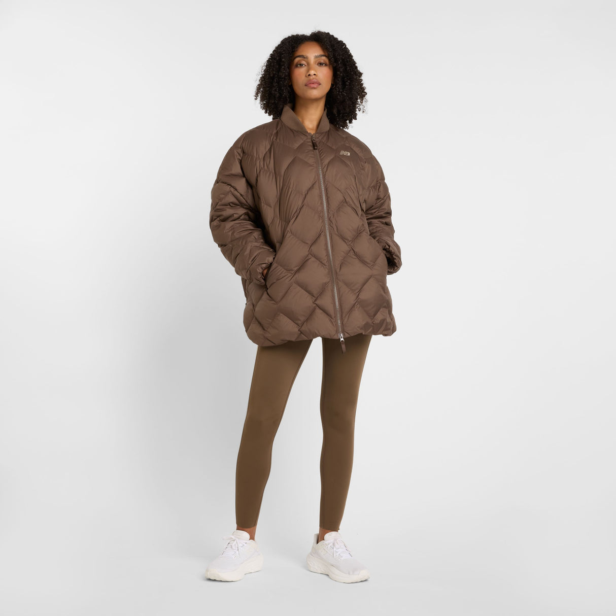 New Balance Women's Pinnacle Bomber Womens Apparel Jackets & Vests