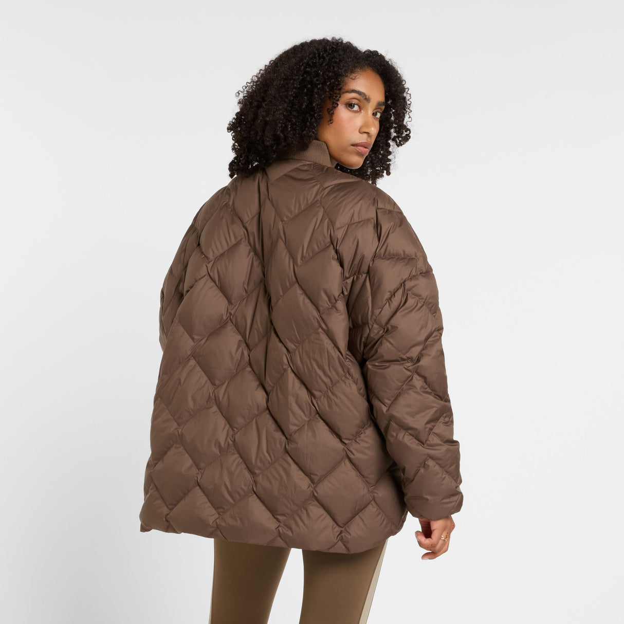 New Balance Women's Pinnacle Bomber Womens Apparel Jackets & Vests