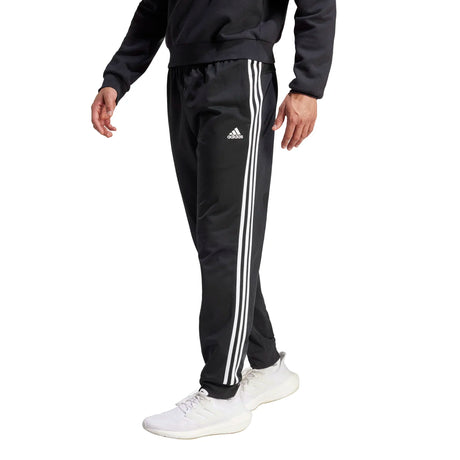 adidas Men's Essentials Warm-Up Tapered 3-Stripes Tracksuit Pants Mens Apparel Pants & Sweatpants