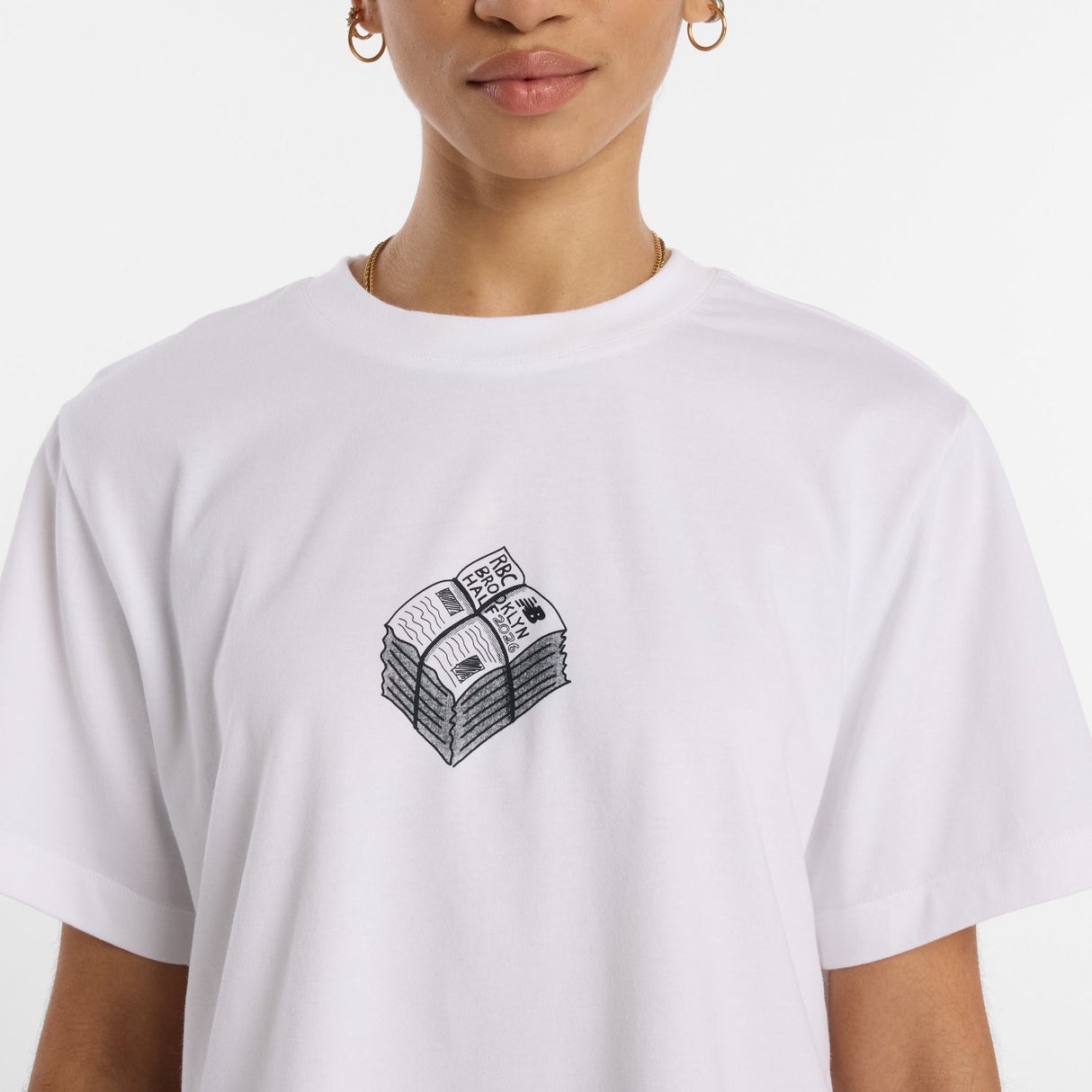 New Balance Women's RBC Brooklyn Half Graphic T-Shirt - Newspaper-5
