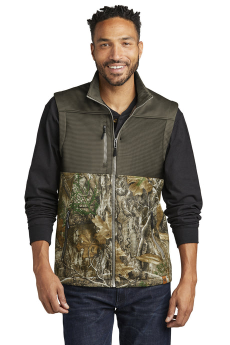 Russell Outdoors Men's Realtree Atlas Colorblock Soft Shell Vest. RU604 Russell Outdoors