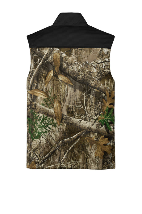 Russell Outdoors Men's Realtree Atlas Colorblock Soft Shell Vest. RU604 Russell Outdoors