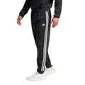adidas Men's Essentials Warm-Up Tapered 3-Stripes Tracksuit Pants Mens Apparel Pants & Sweatpants