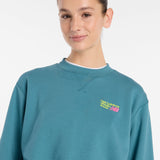 New Balance Women's Athletics Premium Logo Relaxed Crop Crew-5