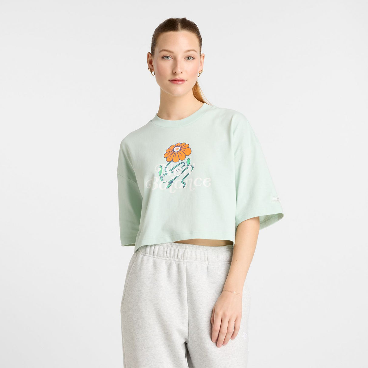 New Balance Women's Athletics Flower Oversized Cropped T-Shirt-1