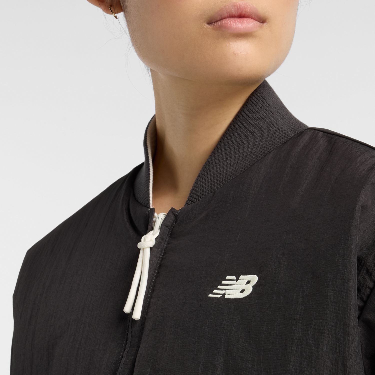 New Balance Women's NB X Bomber Jacket | League Outfitters