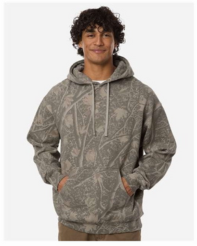 A man wearing a gray camouflage hoodie with a tree branch print, standing against a light gray background.