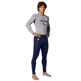 Front view of male model in gray Champro Youth Lightning 2.0 compression long sleeve top and navy full length tights